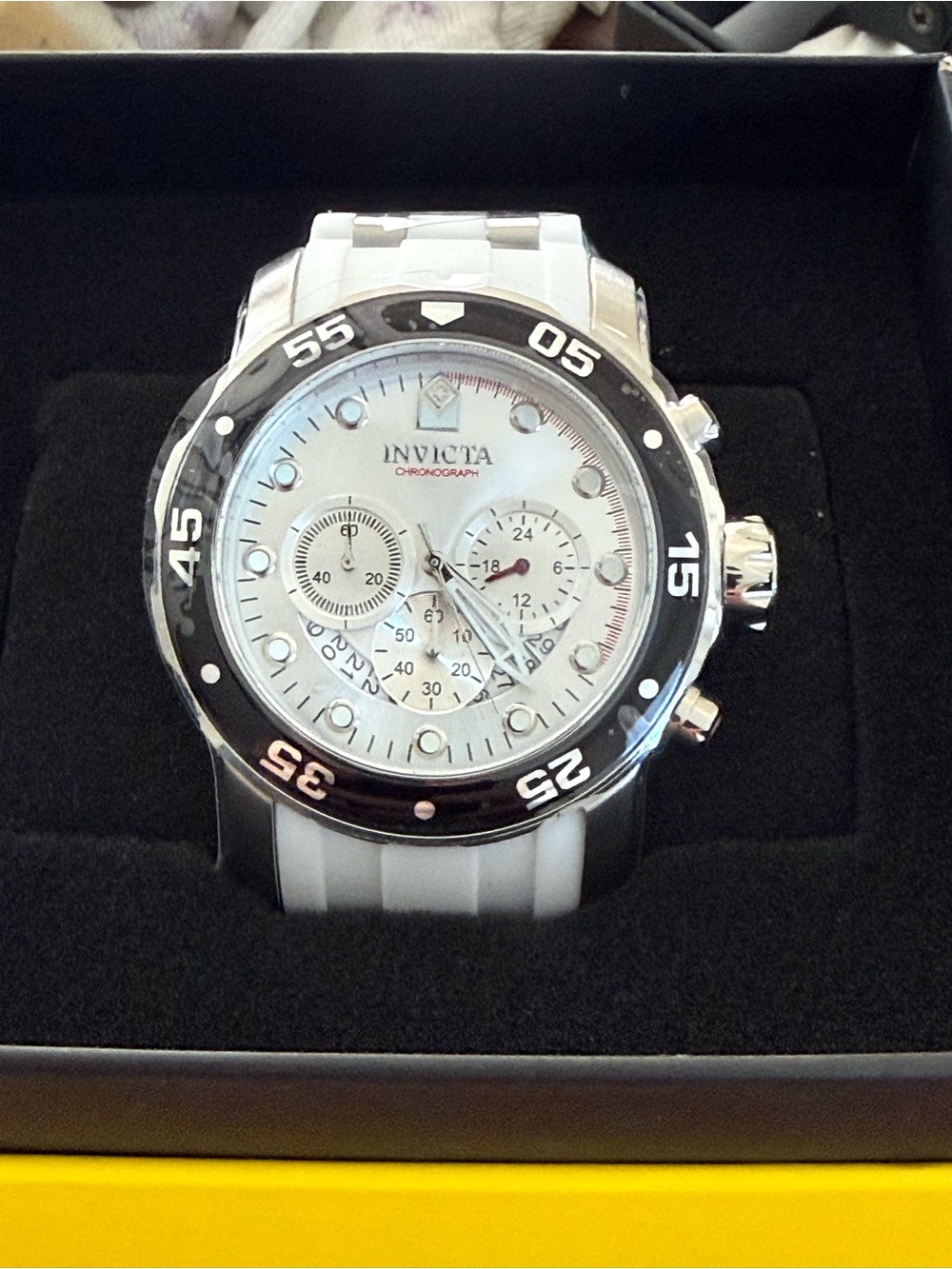 Invicta White Dial Chronograph Watch with Black Bezel